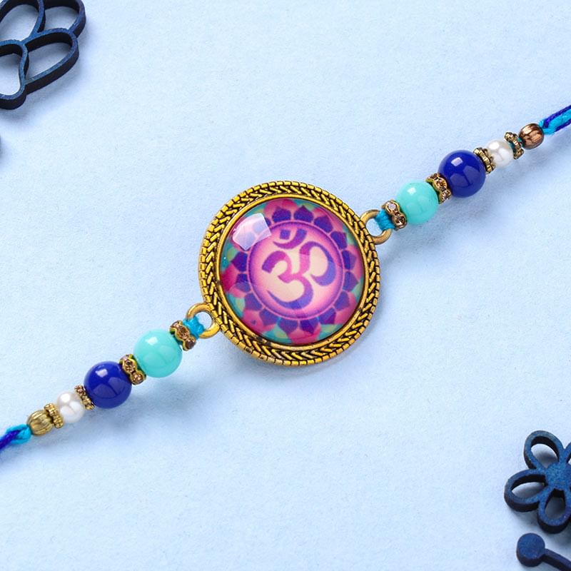 Om Dial Beaded Blue Rakhi